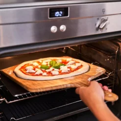 Ooni Pizzabackstahl 13 11 Ooni Pizzabackstahl 13 -Campingbedarf Geschäft pizza mit 33cm durchmesser im heimischen kuechenofen backen ooni backzubehoer pizzabackstahl13 1000 4 27310
